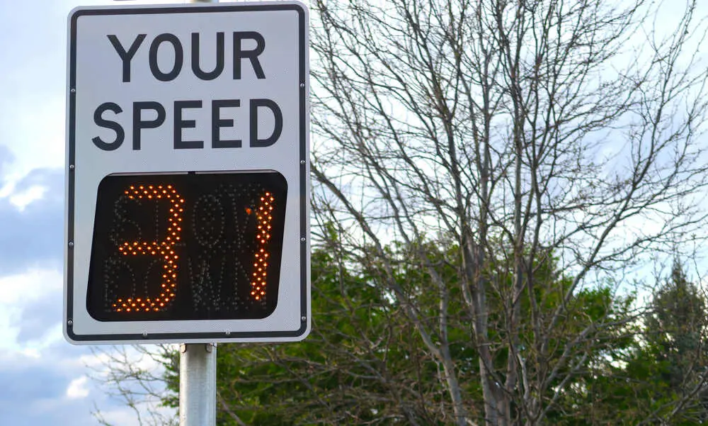 Digital speed sign. Your speed 31.