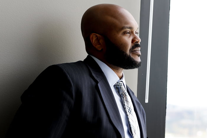 Man looking out a window