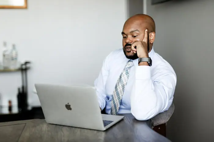 Man looking at a laptop