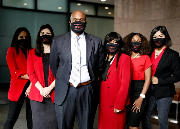 Team members of Holston & Huntley Bankruptcy & Personal Injury wearing masks