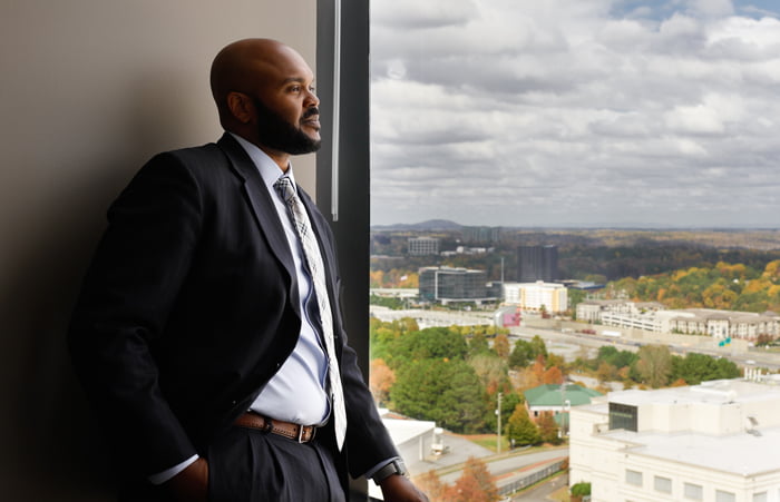 Man looking out a window