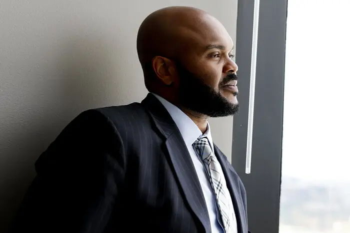 Man looking out a window